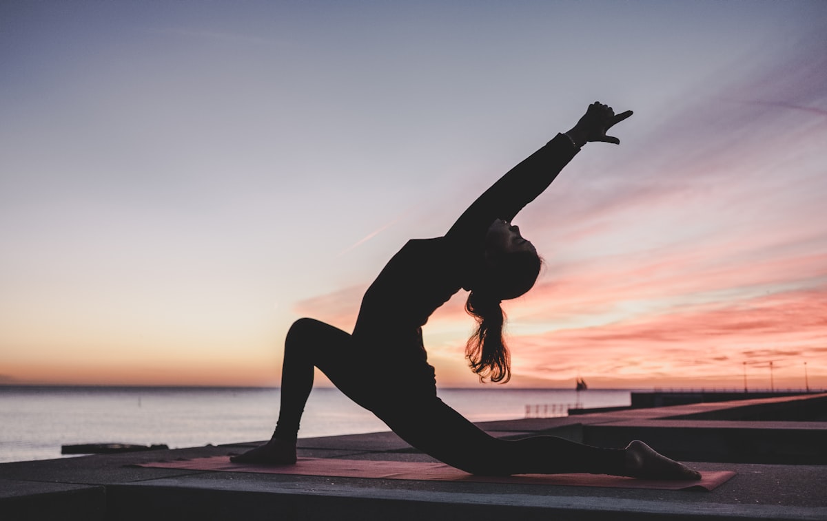 Person performing dynamic stretching routine